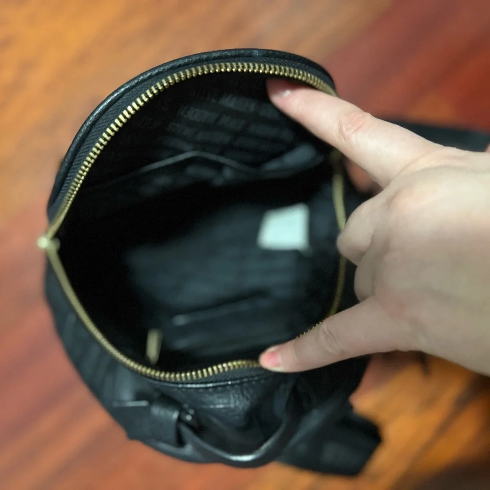 Steve Madden Black Mini Backpack with gold zipper